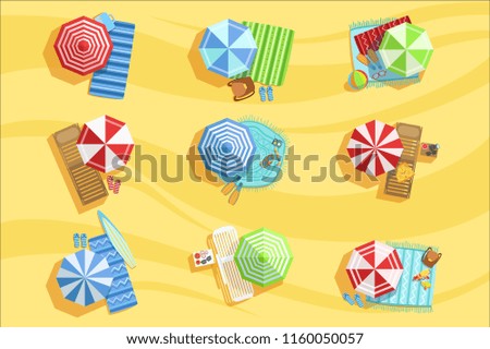 Sandy Beach From Above With Umbrellas And Sunbeds