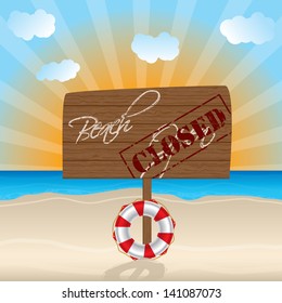 Sandy beach with Closed beach wooden sign