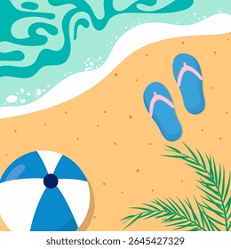 sandy coastline with flip flops and beach ball top view