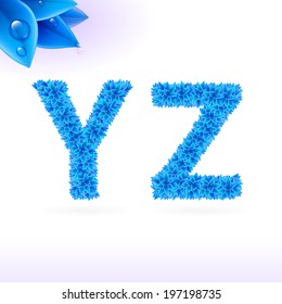 Sans serif font with blue leaf decoration on white background. Y and Z letters