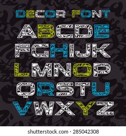 Sanserif decorative font covered with graffiti. Color font on black background