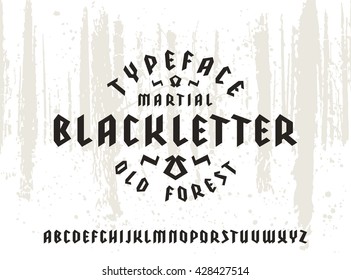 Sanserif font in black letter style. Gothic typeface on forest texture background