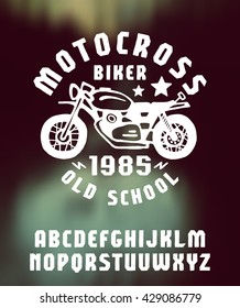 Sanserif font hand-drawn. Extra bold face. Graphic design for t-shirt. White print on blurred background