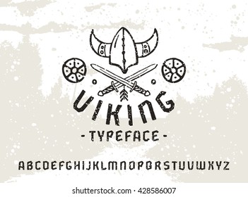 Sanserif font in historical style with texture. Viking typeface. Black print on light background