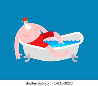 Santa in bath. Klaus is relaxing in bathtub. New year and christmas grandfather