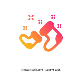 Santa boots icon. Christmas or New year sign. Claus symbol. Classic flat style. Gradient santa boots icon. Vector