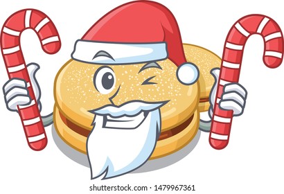 Santa with candy alfajores isolated with in the mascot