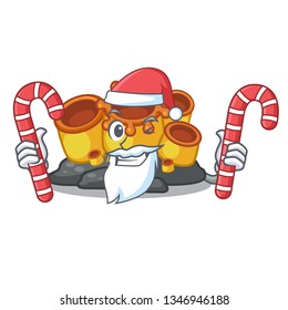 Santa with candy orange sponge coral in shape mascot