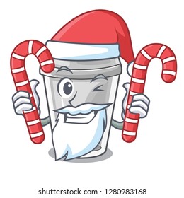 Santa with candy plastic cup on a cartoon table