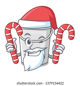 Santa with candy plastic tube bucket in the mascot