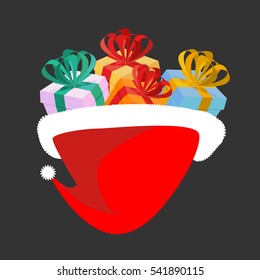 Santa cap with gifts. Sweets and toys for children. traditional Holiday Christmas hat for gift. Xmas template
