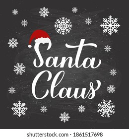 Santa Claus calligraphy hand lettering on chalkboard background with snowflakes. New Year and Christmas typography poster. Vector template for greeting card, banner, flyer, logo design, etc.