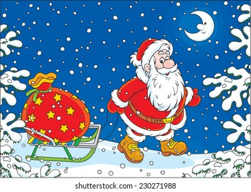 Santa Claus carrying a big bag of Christmas gifts on his sledge through the snow-covered forest