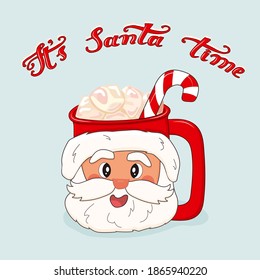 Santa Claus cup in red Santa hat with marshmallows and red white lollipop. Its Santa time lettering