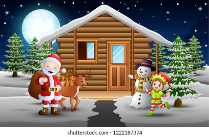 Santa claus and elf standing in front of the snowing house