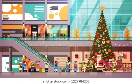santa claus elves give present gift box mix race children group modern retail store interior decorated for christmas holiday new year concept flat horizontal vector illustration