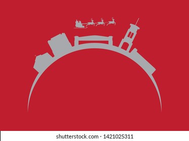 Santa Claus flying over city skyline of Bakersfield in United States