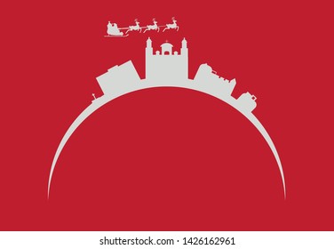 Santa Claus flying over city skyline of Las Palmas de Gran Canaria in Spain