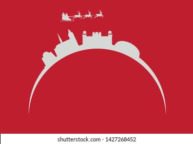 Santa Claus flying over Karachi city skyline in Pakistan