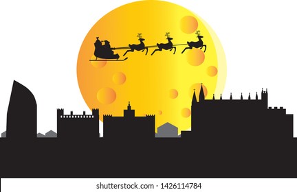 Santa Claus flying over skyline of Palma city in Mallorca in Spain