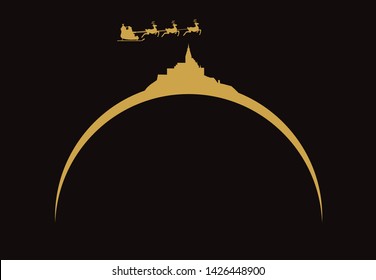 Santa Claus flying over skyline of Abbey of Mont Saint-Michel in France