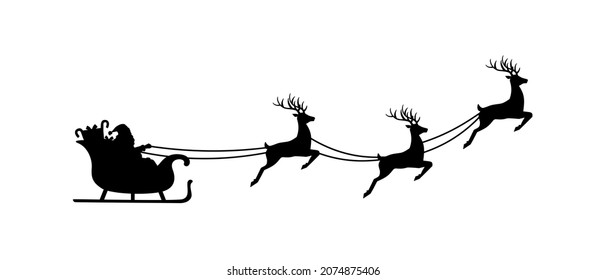 Santa Claus is flying in sleigh with Christmas reindeer. Silhouette of Santa Claus and sleigh