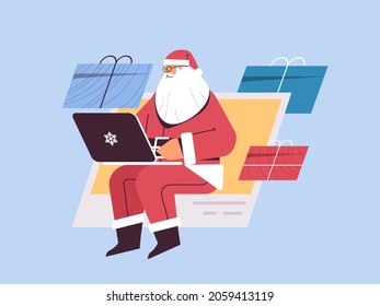 santa claus with gift box using laptop in web browser window happy new year merry christmas holiday celebration