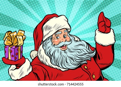 Santa Claus with gift. New year and Christmas. Pop art retro vector illustration