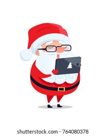 Santa Claus in glasses with digital tablet reads wish list and takes orders vector postcard isolated on white. Father Christmas cartoon character