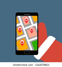 Santa Claus Hand Holding smartphone with map