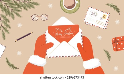 Santa claus hands holding envelope. Sending or receiving Christmas postcard with congratulations. Top view. Vector illustration in flat cartoon style. Winter holiday wishes.