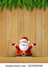 Santa Claus with his hands up stands against wood background. Christmas template with pine branches on top and Santa below