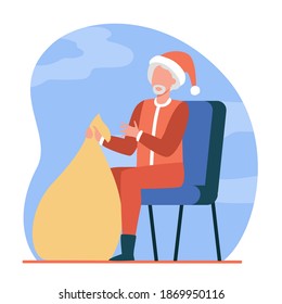 Santa Claus holding bag of gifts. Bearded Santa in red costume and cap with sack of presents flat vector illustration. Christmas, celebration concept for banner, website design or landing web page