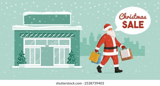 Santa Claus holding bags and doing Christmas shopping, sale and offers concept