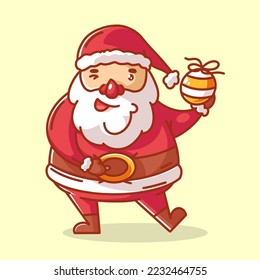 Santa Claus holds a Christmas ball in his left hand