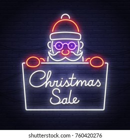 Santa claus neon sign. Christmas Sale neon sign. Merry Christmas and Happy New Year banner, logo, emblem and label. Bright signboard, light banner. 