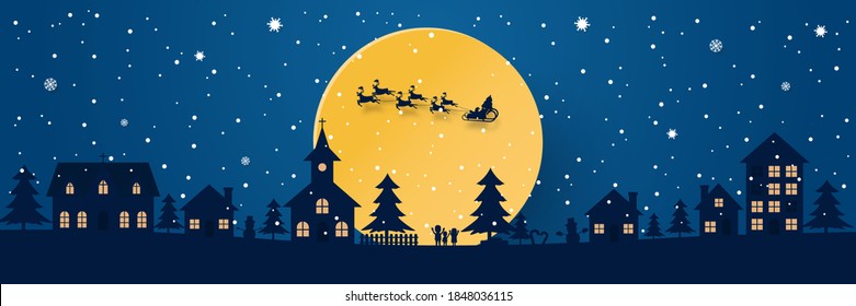 Santa claus on the sky coming city village with christmas tree in night time with snowfall. Christmas season and Happy new year season