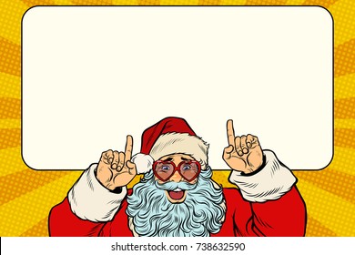 Santa Claus points to the white background. Pop art retro vector illustration