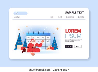santa claus in red costume near holiday planner christmas organizer happy new year merry christmas holidays celebration concept