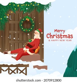 Santa Claus Relaxing With Hot Drink At Stair Of Entrance Door Decorated From Wreath, Pine Leaves On Snow Falling Blue Background. Merry Christmas And New Year Concept.