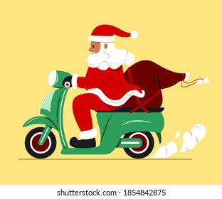 El Santa Claus montó una motocicleta con una bolsa de regalo.