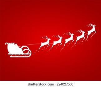 Santa Claus rides in a sleigh in harness on the reindeer 