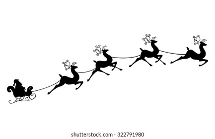 Santa Claus rides in a sleigh in harness on the reindeer