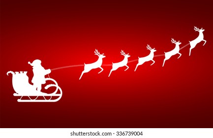 Santa Claus rides in a sleigh in harness on the reindeer