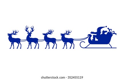 Santa Claus rides in a sleigh in harness on the reindeer