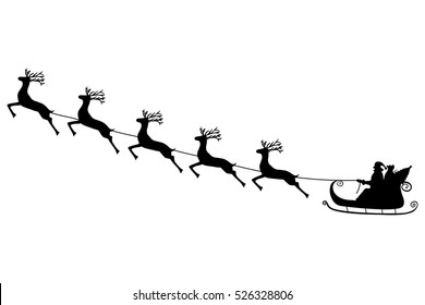 Santa Claus rides in a sleigh in harness on the reindeer