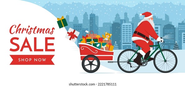 Santa Claus riding a bicycle with trailer and delivering Christmas gifts, Christmas sale concept