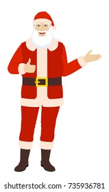 Santa Claus showing thumb up and showing something. Full length portrait of Santa Claus in a flat style. Vector illustration.