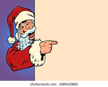 Santa Claus shows an empty banner a place for advertising and a poster. Christmas and New Year. Winter seasonal holiday