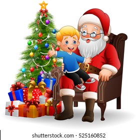 Santa Claus sitting with a little cute boy 